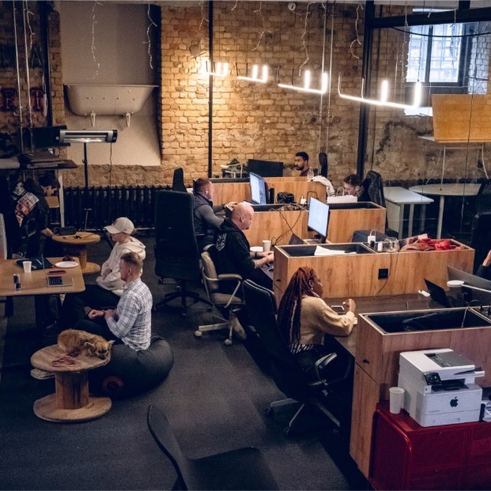 Teams working at desks during the hackathon at Double9
